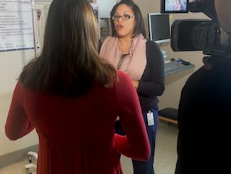 Nurse practitioner Elizabeth Conde Alvarez is interviewed by Victoria Wreslio of NBC 29.