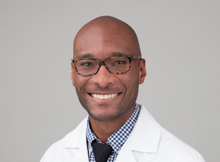 Headshot of Dr. Taison Bell.