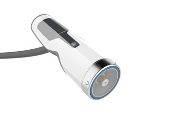 A wand used to administer shockwave therapy. It is white tube with a gray wire emerging from the side. It looks a bit like a flashlight.