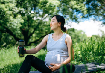 A pregnant woman outdoors