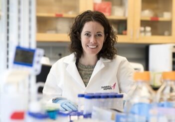 Melanie Rutkowski, PhD, smiles in her lab.