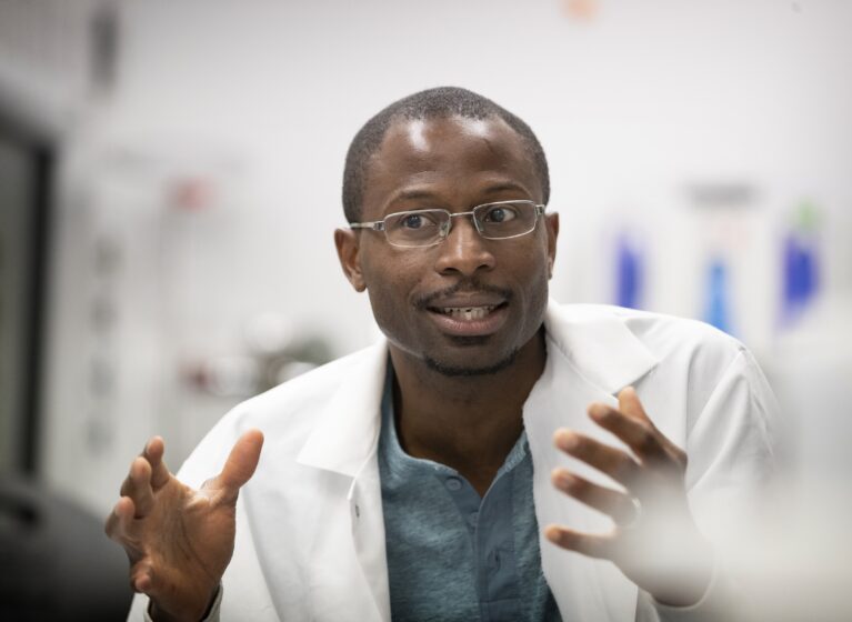 Upkong Eyo, PhD, in his lab